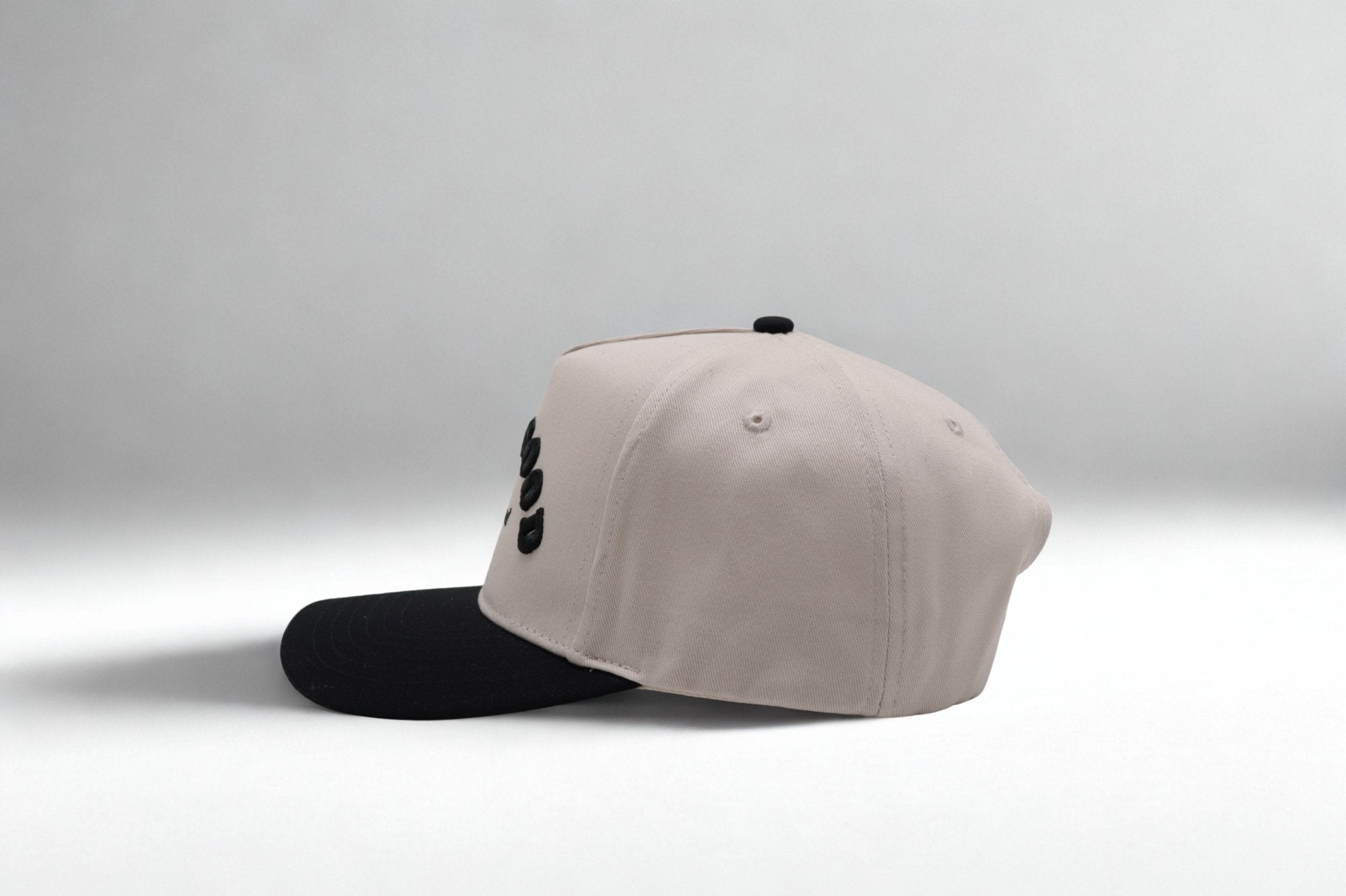 Look Good Play Good Black and Cream Hat - Likeness Brand
